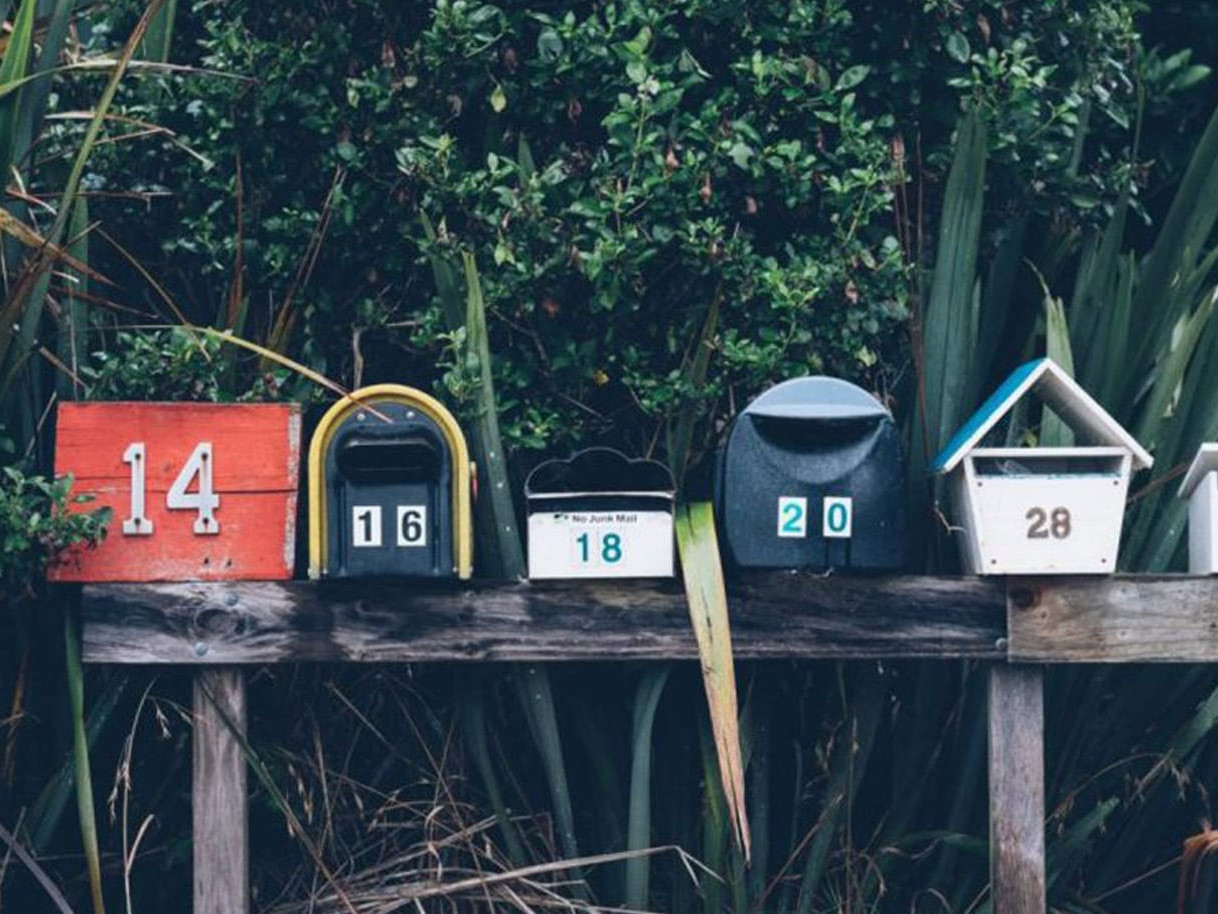 a row of quirky mailboxes