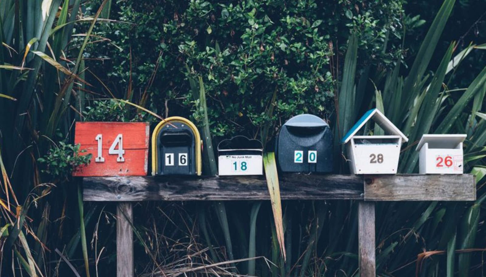 a row of quirky mailboxes