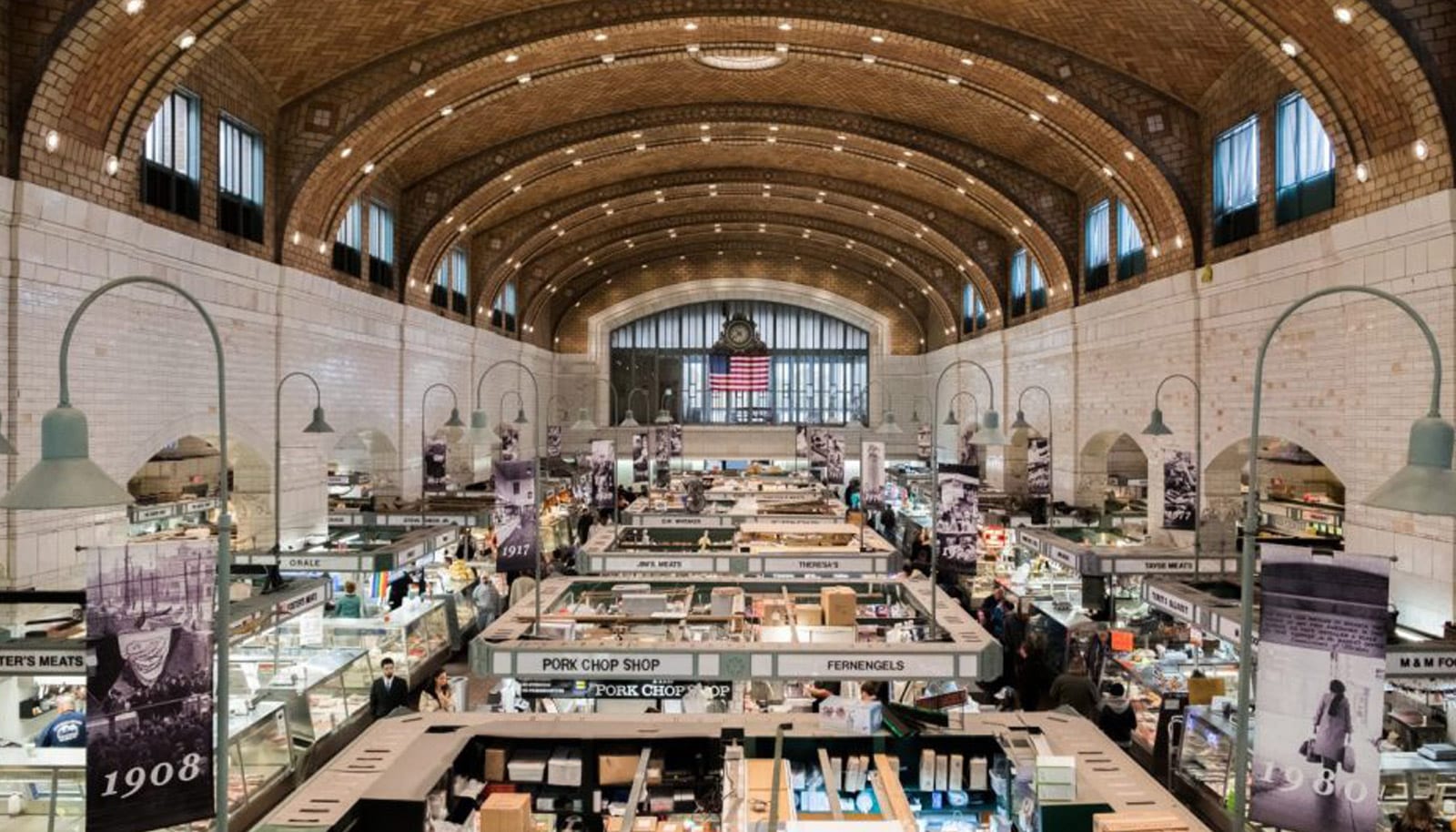 large indoor marketplace with historic architectural structures